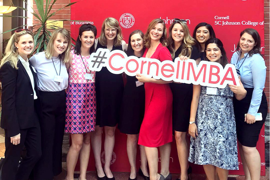 Proud alumni representing the diverse Cornell Johnson MBA community