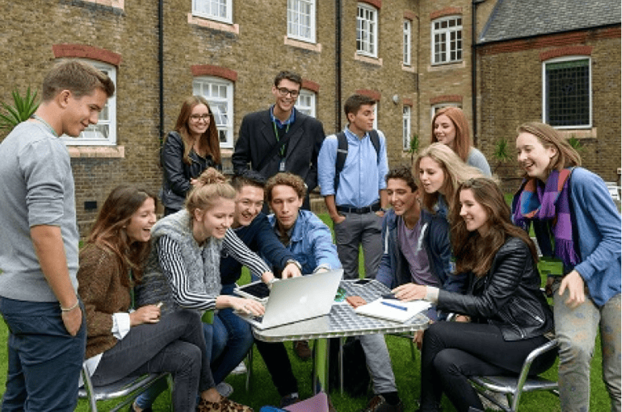 ESCP students collaborating on a project outside on campus