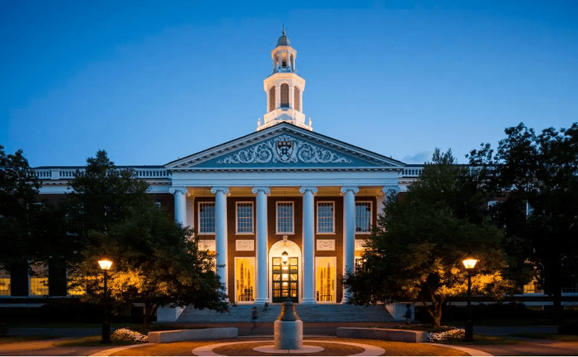 Night view of the iconic Baker Library at Harvard Business School