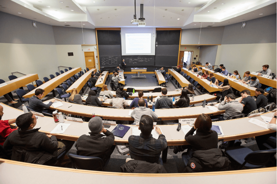 Students participating in a lecture at MIT Sloan