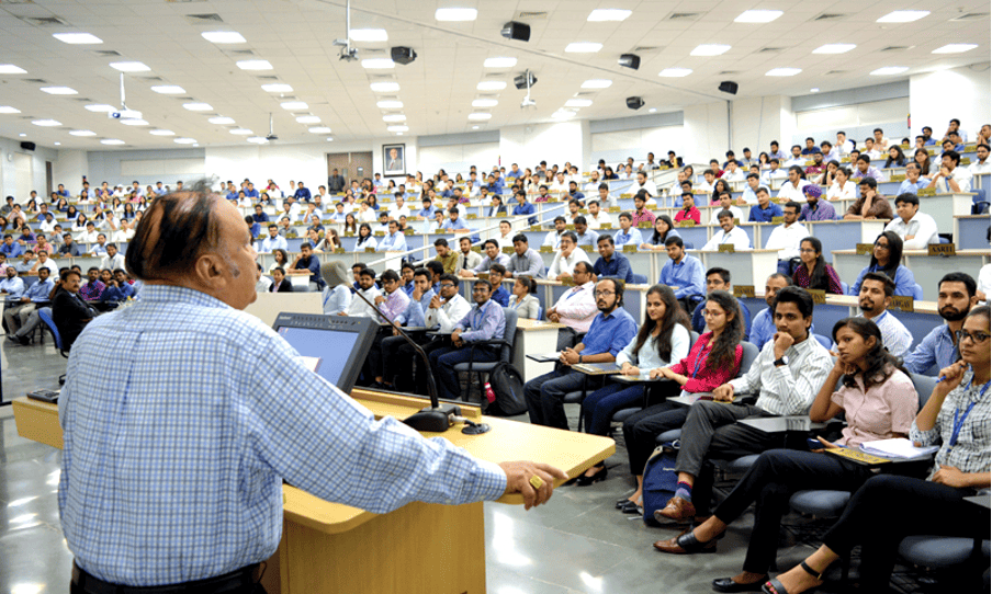 Professor delivering a lecture to students at Great Lakes Institute of Management
