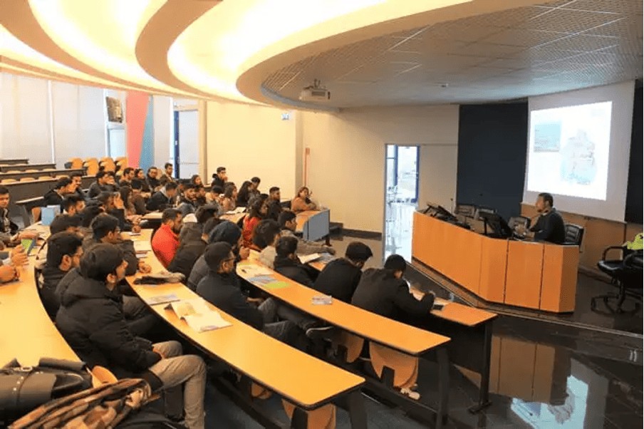 Lecture in Auditorium with Engaged Attendees