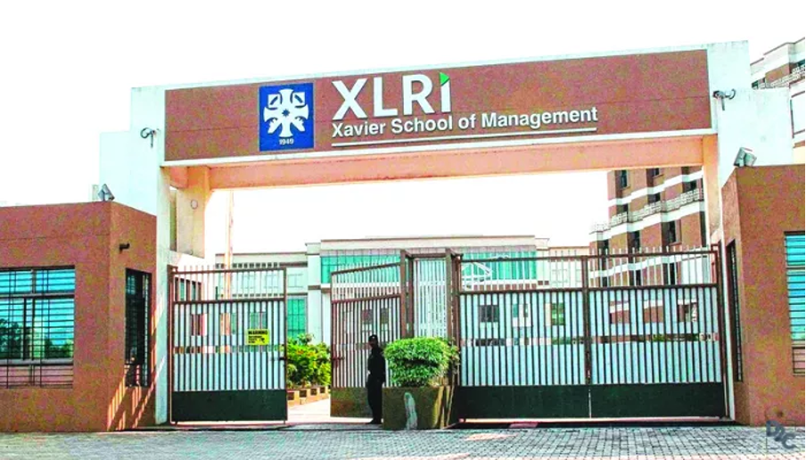 Main entrance gate of XLRI Xavier School of Management with the institute's emblem
